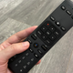 AT&T TV’s remote with a button for the Google Assistant.